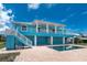 Beautiful waterfront home with a private pool and stunning views of the canal at 1930 Massachusetts Ave, Englewood, FL 34224