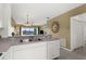The kitchen features sleek countertops, and open floor plan, allowing for seamless interaction with the living spaces at 19375 Water Oak Dr # 203, Port Charlotte, FL 33948