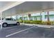 Assigned covered parking space. Keeps your car cool and protected from the elements at 19375 Water Oak Dr # 203, Port Charlotte, FL 33948
