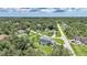 Beautiful aerial shot of a home and lush landscaping at 196 Lecturn St, Port Charlotte, FL 33954