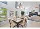 Open dining area with high ceilings connecting to the living room and other spaces at 196 Lecturn St, Port Charlotte, FL 33954