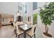 Bright dining room with high ceilings, large windows, and backyard views at 196 Lecturn St, Port Charlotte, FL 33954