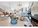 Bright living room with vaulted ceiling, fireplace and open concept layout with backyard views at 196 Lecturn St, Port Charlotte, FL 33954