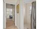 Bathroom featuring a walk-in shower, neutral tile, and access to the Primary bedroom at 23 Pine Valley Ct, Rotonda West, FL 33947