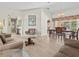 Open-concept living and dining area offers abundant space for entertaining and enjoying everyday living at 23 Pine Valley Ct, Rotonda West, FL 33947