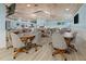 Large event space featuring tables, chairs, and a wood-paneled ceiling, perfect for gatherings at 237 Park Forest Blvd, Englewood, FL 34223