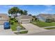 This charming single-story home has an attached garage and a lush front yard with mature trees at 237 Park Forest Blvd, Englewood, FL 34223
