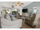 Comfortable living room with plush seating, a ceiling fan, and a relaxing atmosphere at 237 Park Forest Blvd, Englewood, FL 34223