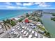 This aerial shows the property in a waterfront community, beach access, and coastal charm at 2373 N Beach Rd # 1C, Englewood, FL 34223