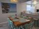 Inviting dining area with bar stool seating, perfect for casual meals and entertaining at 2373 N Beach Rd # 1C, Englewood, FL 34223