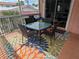 Relaxing patio with seating, ideal for enjoying outdoor moments at 2373 N Beach Rd # 1C, Englewood, FL 34223