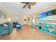 Bright living room showcases stylish decor, tile floors, and a welcoming atmosphere at 2588 Westberry Ter, North Port, FL 34286