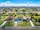 Aerial view of a home, highlighting the well-maintained landscaping and manicured lawns at 262 Rotonda N Blvd, Rotonda West, FL 33947
