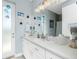 Contemporary bathroom vanity with a spacious countertop and modern lighting at 262 Rotonda N Blvd, Rotonda West, FL 33947