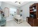 Home office featuring a built-in desk, large window and ample natural light at 262 Rotonda N Blvd, Rotonda West, FL 33947