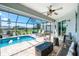 Inviting screened-in pool area with ample space for lounging and recreation at 262 Rotonda N Blvd, Rotonda West, FL 33947