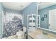 Nautical themed bathroom with a vanity, mirror, and a shower/tub at 26294 Bridgewater Rd, Punta Gorda, FL 33983