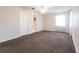 Generously sized bedroom featuring carpet flooring and access to a walk-in closet at 3085 Crowder St, Punta Gorda, FL 33980