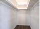 Walk-in closet with white shelving and ample storage space at 3085 Crowder St, Punta Gorda, FL 33980