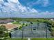 Aerial view of the expansive community tennis courts at 3207 Village Ln, Port Charlotte, FL 33953
