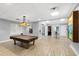 The game room with billiard table offers a fun recreational space for residents at 3207 Village Ln, Port Charlotte, FL 33953