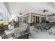 Relax and unwind in the covered outdoor seating area of the community clubhouse at 3207 Village Ln, Port Charlotte, FL 33953