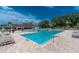 A refreshing swimming pool offers an ideal place to relax and enjoy the beautiful community at 3207 Village Ln, Port Charlotte, FL 33953