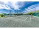 Scenic view of the community tennis courts at 3207 Village Ln, Port Charlotte, FL 33953