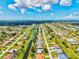 Overhead image of homes lining a canal with many featuring pools on their property in a well-spaced neighborhood at 34 Broadmoor Ln, Rotonda West, FL 33947