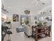Open living room with comfortable seating, tasteful decor, and bright natural light at 34 Broadmoor Ln, Rotonda West, FL 33947