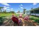Backyard firepit area, perfect for relaxing outdoors at 55 Mark Twain Ln, Rotonda West, FL 33947