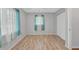 Empty bedroom with tile floor, neutral walls, and ample natural light creating a versatile space at 55 Mark Twain Ln, Rotonda West, FL 33947