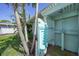 Enclosed outdoor shower with private access, perfect for rinsing off after outdoor activities at 55 Mark Twain Ln, Rotonda West, FL 33947