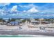 Charming beachfront homes with direct access to the sandy shores and beautiful blue sky at 70 Wilhelm Dr, Englewood, FL 34223