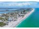 Expansive aerial view of a vibrant coastal community with stunning beachfront properties at 70 Wilhelm Dr, Englewood, FL 34223