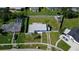 Aerial view of a property with a pool and a fenced yard with a boat at 700 Floral Ln, Port Charlotte, FL 33952