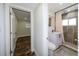 Updated bathroom features a modern vanity, toilet, and tiled walk-in shower at 700 Floral Ln, Port Charlotte, FL 33952