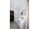 Updated bathroom with modern fixtures, toilet, and vanity with matte black hardware at 700 Floral Ln, Port Charlotte, FL 33952