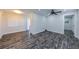 Bright living room with modern flooring, recessed lighting, and access to a patio at 700 Floral Ln, Port Charlotte, FL 33952