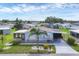 Well-maintained home in a friendly community with a mature palm tree and covered parking at 742 Portwine Ct # 17, Englewood, FL 34223