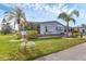 Delightful single-story home with lush greenery and a serene, well-maintained lawn at 742 Portwine Ct # 17, Englewood, FL 34223