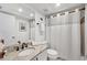 Cozy bathroom featuring a granite-topped vanity and shower-tub combo with white curtain at 7554 Palm Island S Dr # 1813, Placida, FL 33946
