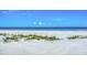 The private beach area is ready for the new owner to enjoy the white sand and Gulf breezes at 7554 Palm Island S Dr # 1813, Placida, FL 33946
