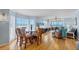 Bright dining area with large windows showcasing ocean views, perfect for entertaining guests at 7554 Palm Island S Dr # 1813, Placida, FL 33946