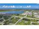 Large aerial view of the area's roadways, buildings and open waters at 7690 Castleberry Ter, Englewood, FL 34224