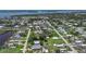 Wide aerial view of the neighborhood and surrounding waterways at 8224 Pinetree Ln, Englewood, FL 34224