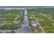 The home is set amongst lush vegetation and backs up to a beautiful winding canal at 10079 Lebanon Dr, Port Charlotte, FL 33981