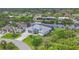 Spacious waterfront home with lush landscaping and private boat dock for easy water access at 10079 Lebanon Dr, Port Charlotte, FL 33981