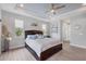 Beautiful primary bedroom suite with ample natural light and modern décor at 10079 Lebanon Dr, Port Charlotte, FL 33981