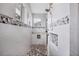 Modern walk-in shower with decorative tile accents and built-in niche at 10079 Lebanon Dr, Port Charlotte, FL 33981